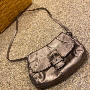 Coach Crossbody Leather Small Bag The Color is Possibly a Bronze or a Gold Color
